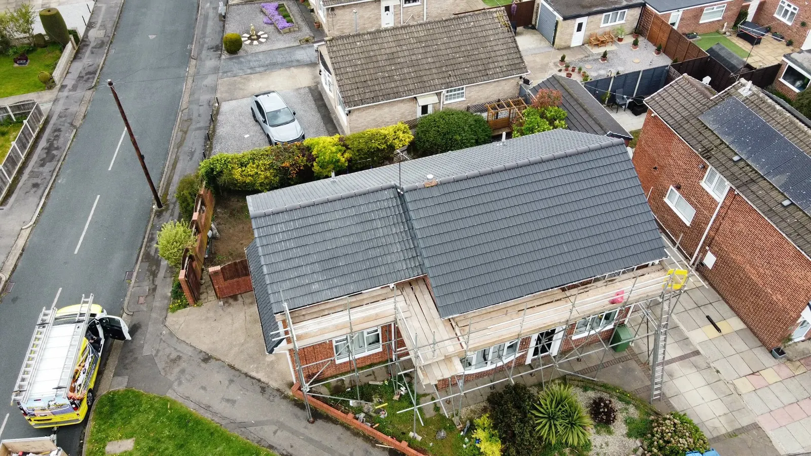 Aerial view of a finished grey tiled roof
