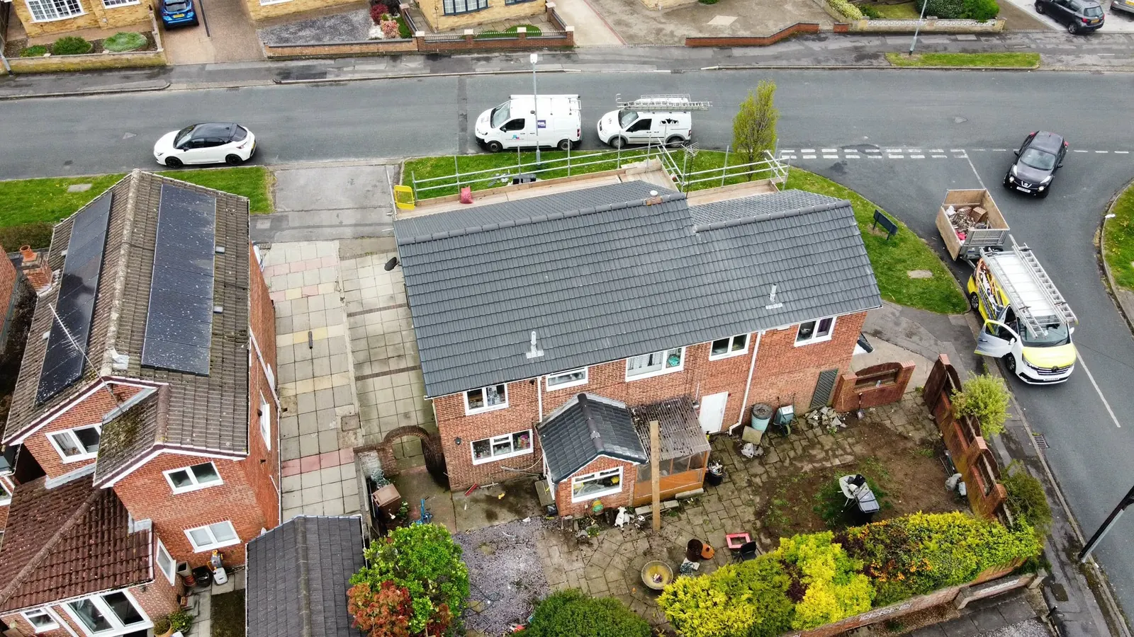Drone view over a row of finished roofs on a Hull street