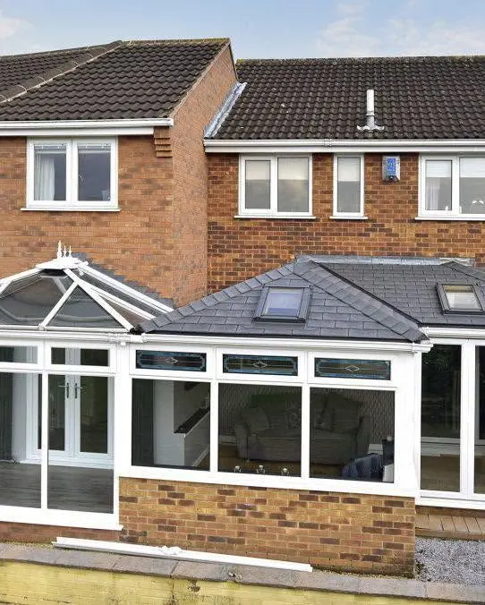 Conservatory converted to a solid tiled roof