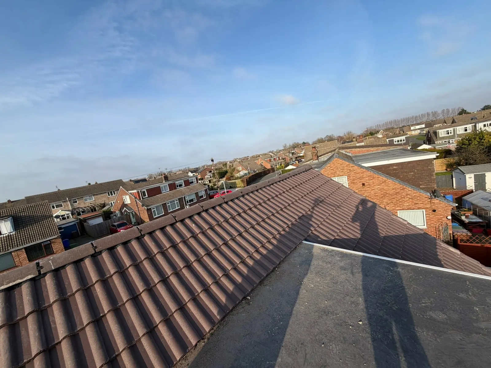 New tiled roof looking out over the rooftops