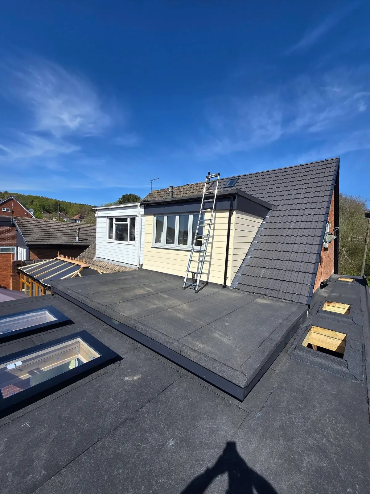 Flat roof with a dormer and roof lights