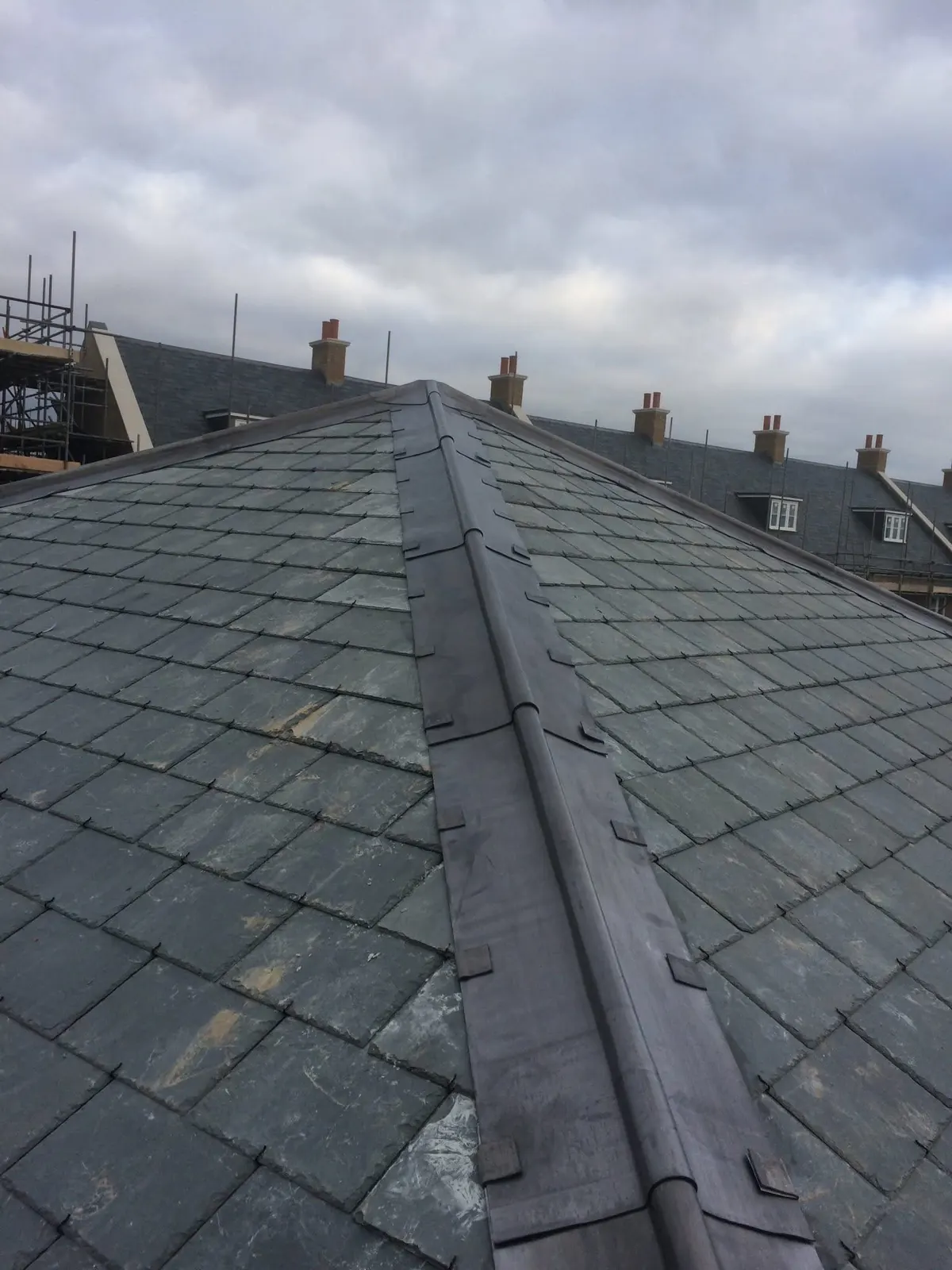 Slate roof with a new ridge line