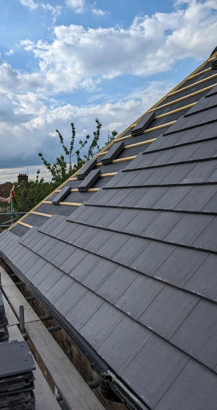 Grey tiled roof slope