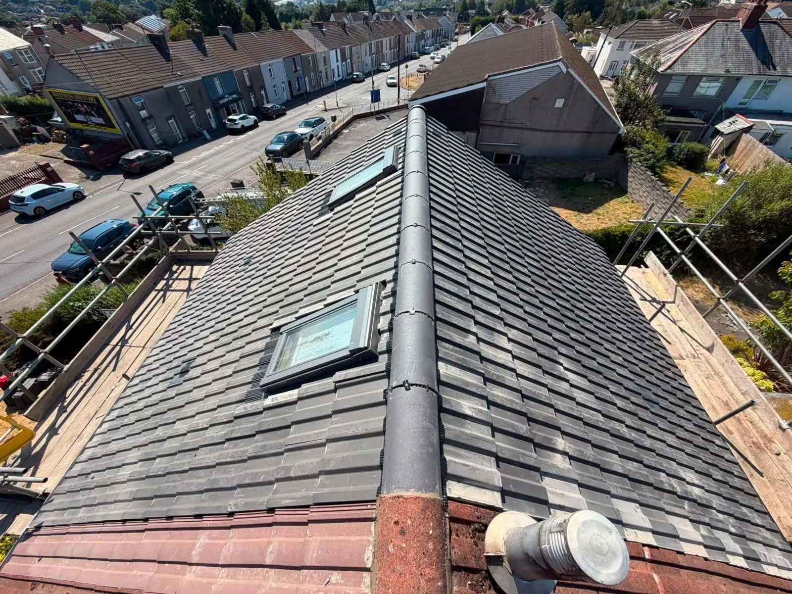 Grey tiled roof with roof windows