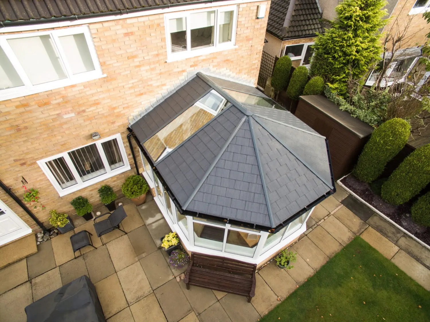 Conservatory with a new tiled roof from the drone